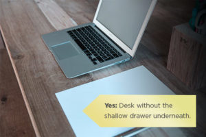 Style of desk that has no drawer for pens.