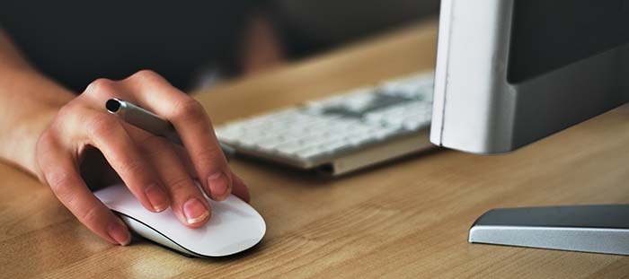 women in web development desk with keyboard