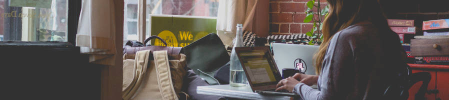 Women web developer working on a project at home.